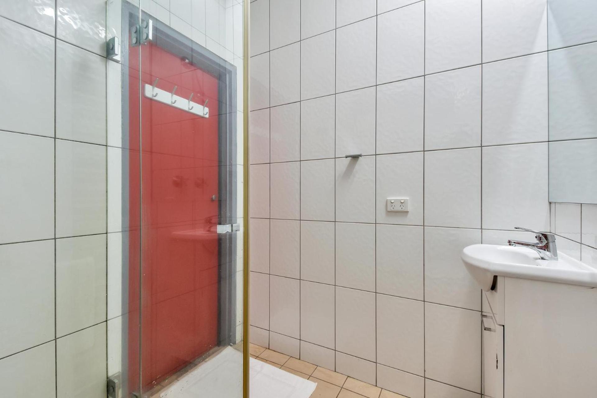 Hotel Capitanos Darwin Pokoj fotografie