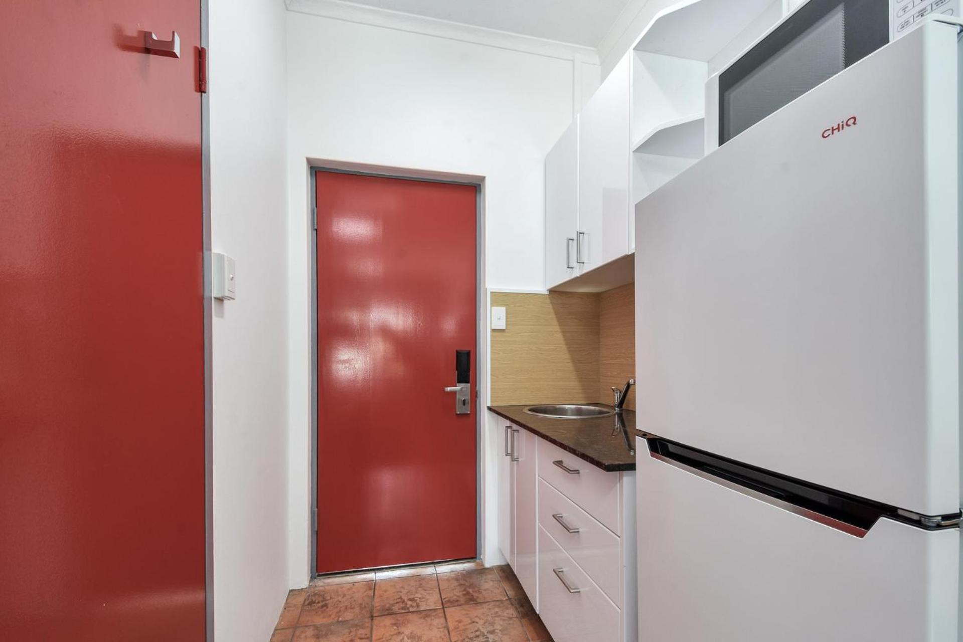 Hotel Capitanos Darwin Pokoj fotografie