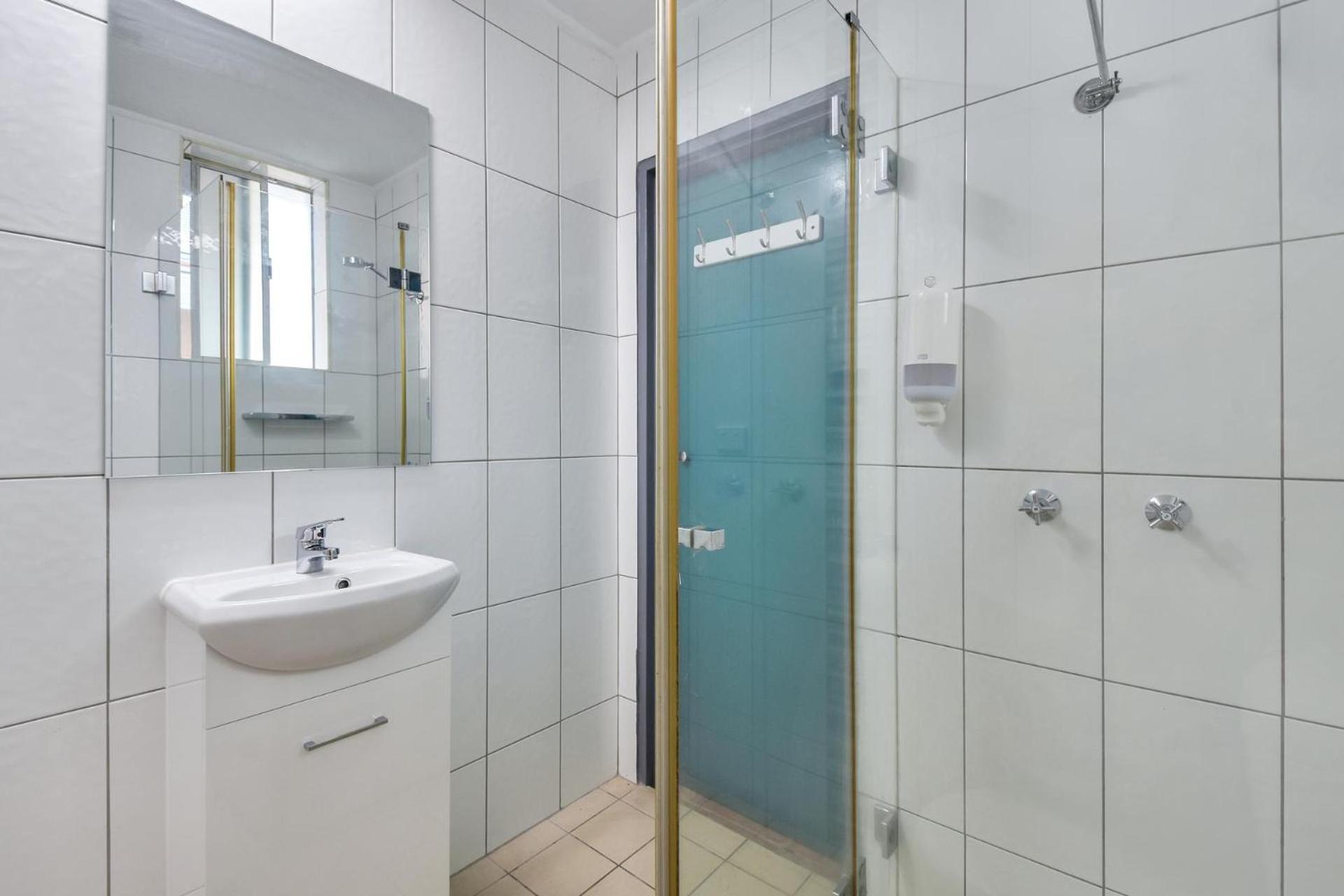 Hotel Capitanos Darwin Pokoj fotografie